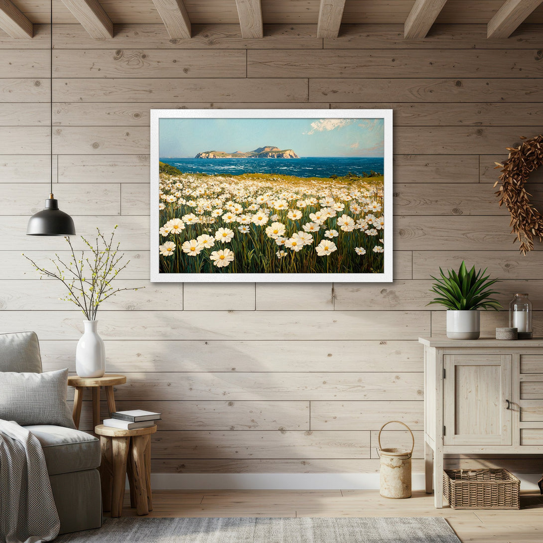 Framed Poster featuring a coastal landscape with white flowers, blue sea, and a soft, natural color palette. Enhance your space!
