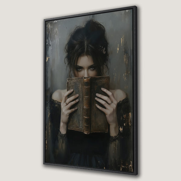 Framed Wall Art: Mysterious woman with dark hair and piercing eyes, holding a vintage book. Moody, artistic style with a gray, black, and gold color palette.