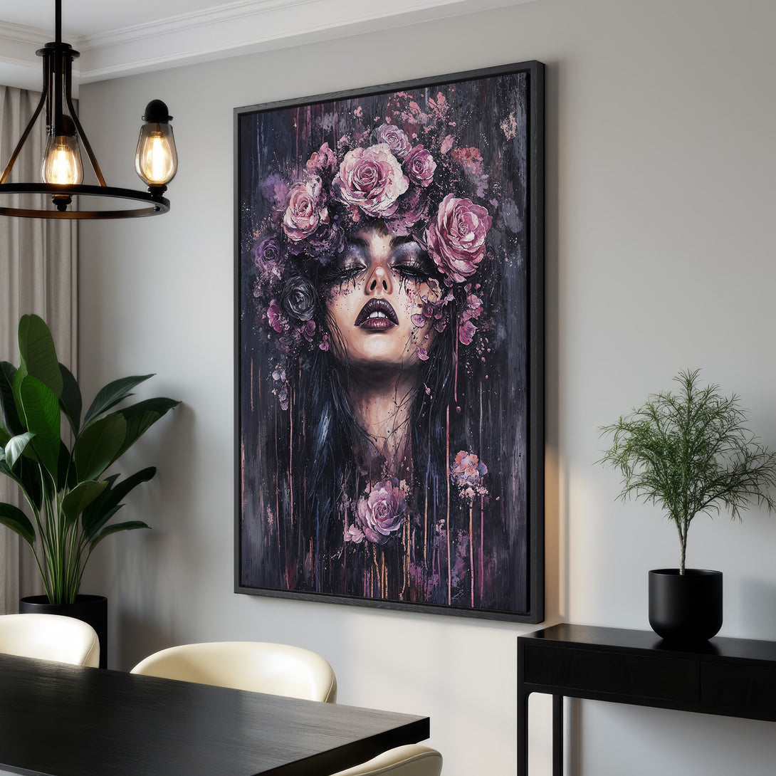 Framed Wall Art featuring a woman with a floral crown in a dark, moody style. The canvas print showcases a rich purple and black color palette, perfect for adding a touch of elegance.