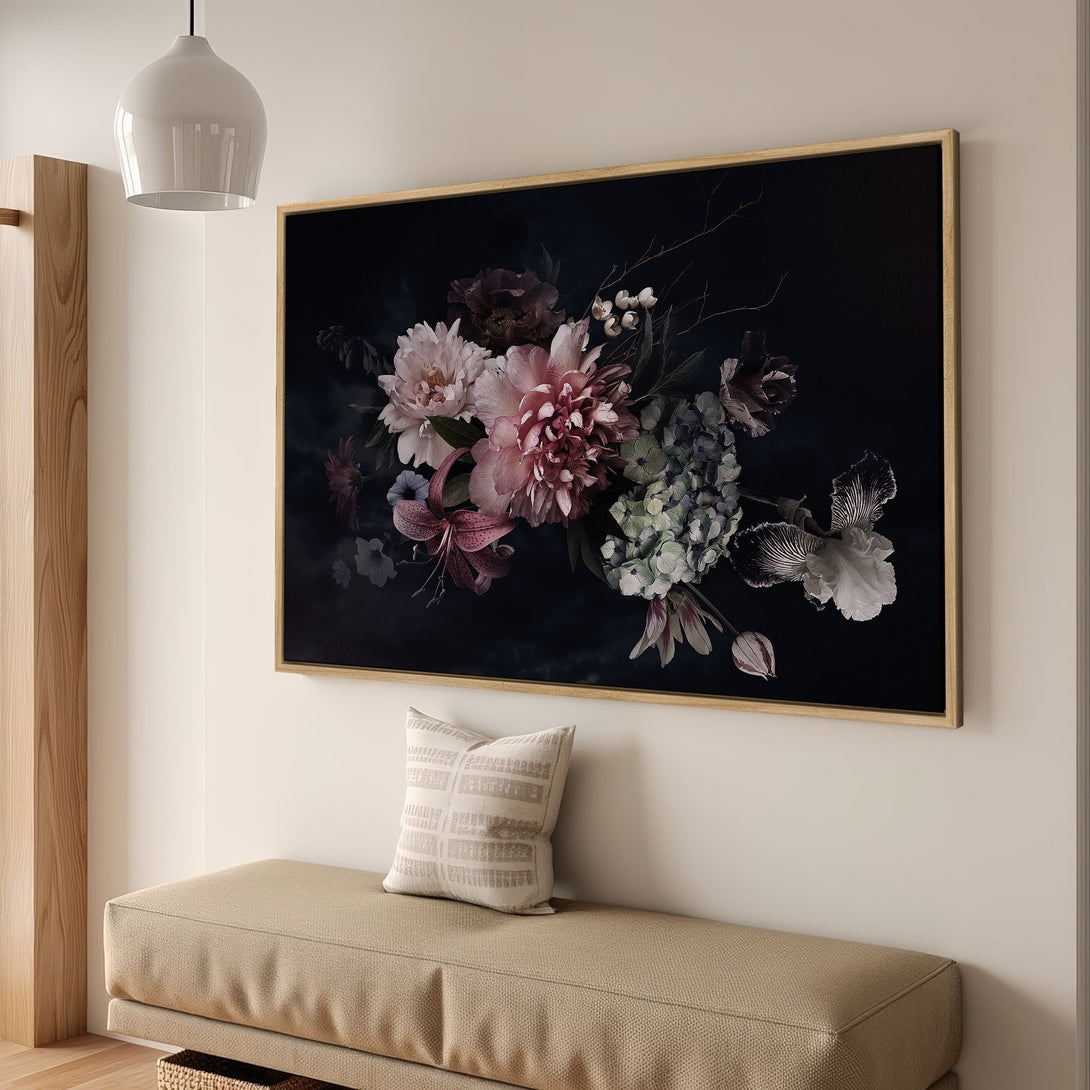 Framed Wall Art featuring a floral still life. Dark moody style with pink, purple, and green blooms against a black backdrop. Perfect for home decor.