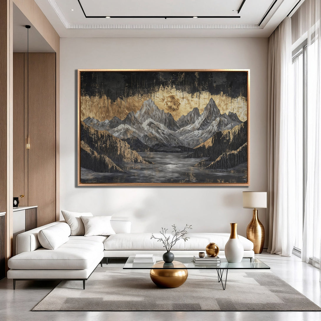 Framed Wall Art featuring a dramatic mountain landscape in gold, black, and gray tones. Modern art for a luxurious interior.