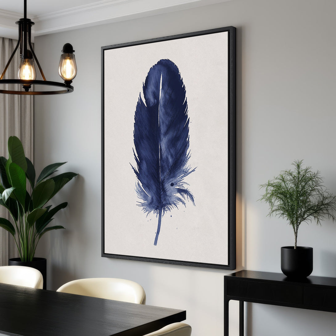 Framed Wall Art featuring a watercolor-style blue feather on a neutral background. Modern art for home decor, perfect for adding a touch of elegance.