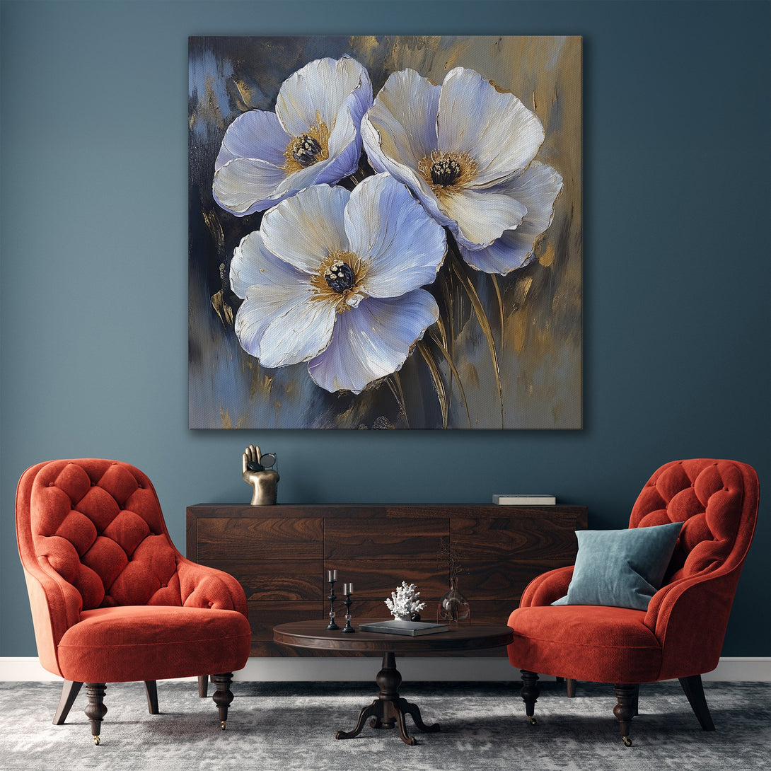 Framed Wall Art of elegant white flowers in a modern living room. Soft, muted blue and gold color palette. Elevate your space with floral art.