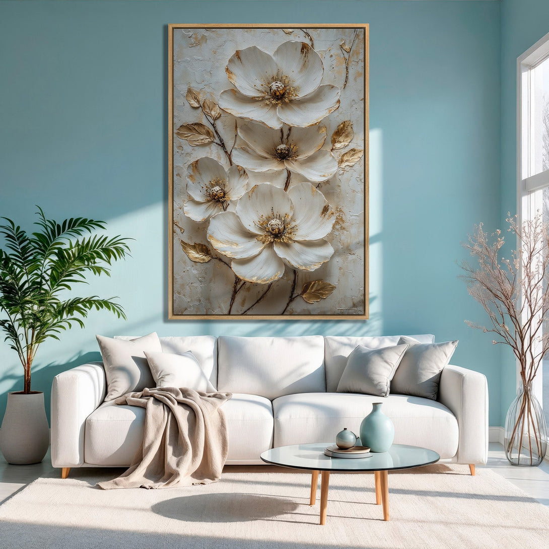 Framed Wall Art: Elegant floral canvas print in neutral tones. Adds a touch of luxury to any space. Featuring white & gold flowers on a light background.