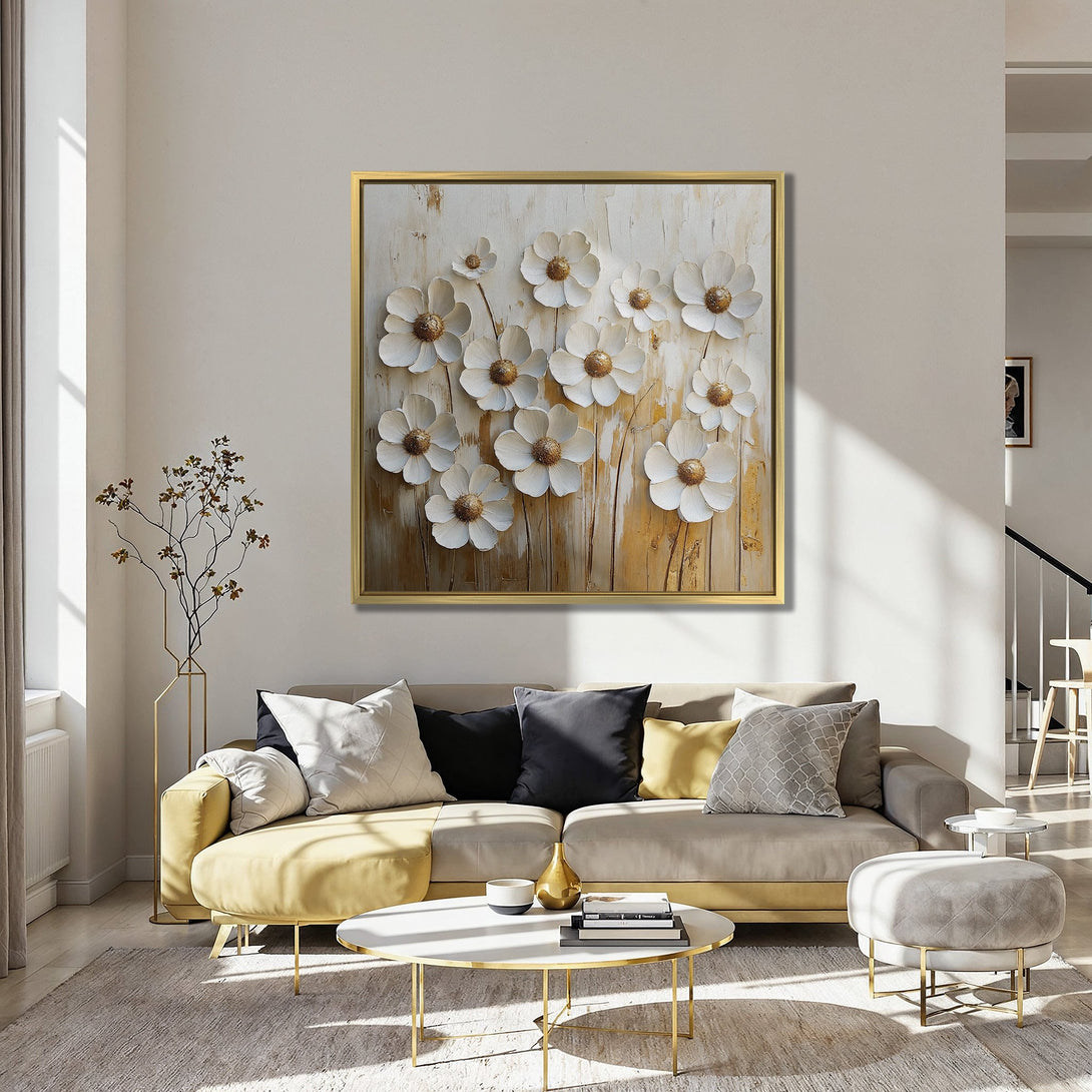 Canvas Print: Textured white flower art with gold accents, displayed in a stylish interior. Features a warm, neutral palette with pops of red and blue.