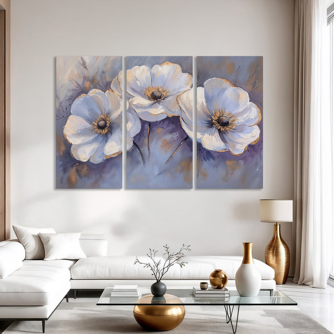 Canvas Print of elegant white floral art with gold accents, displayed in a modern living room with a cool, neutral color palette.