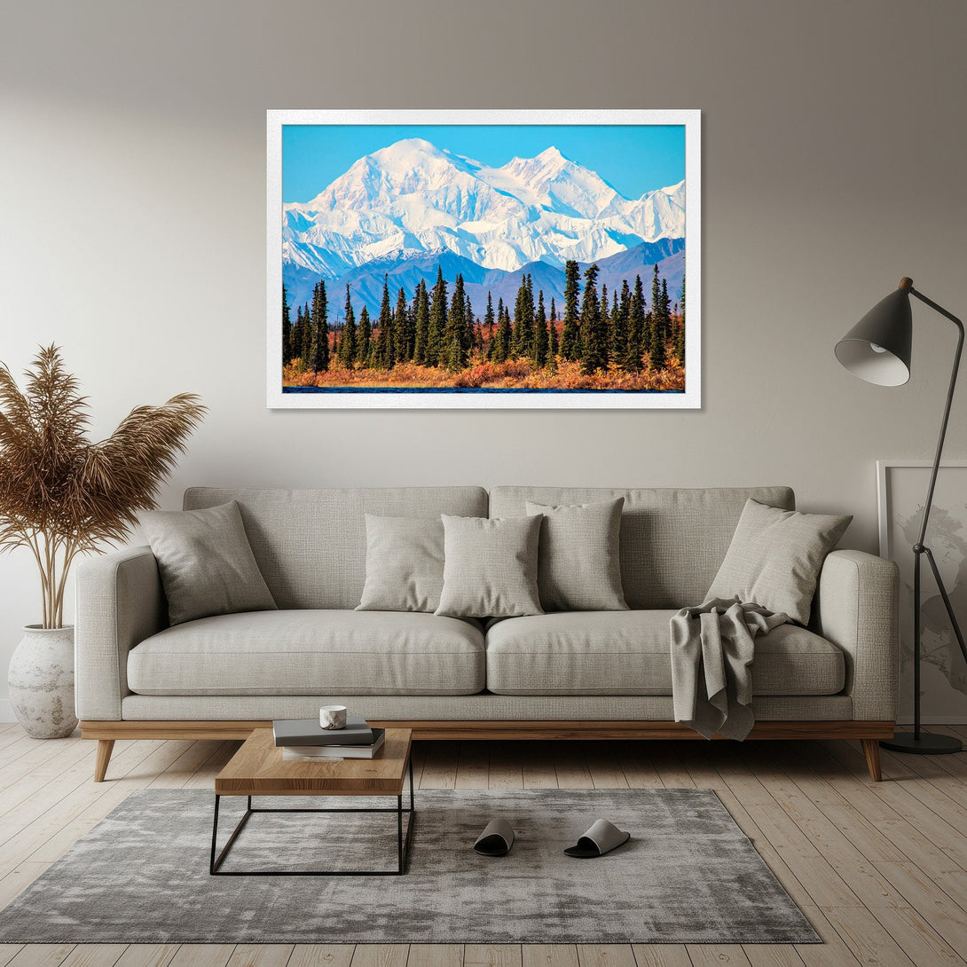 Framed Poster featuring a stunning mountain landscape with a blue and white color palette, perfect for adding a touch of nature to your home.