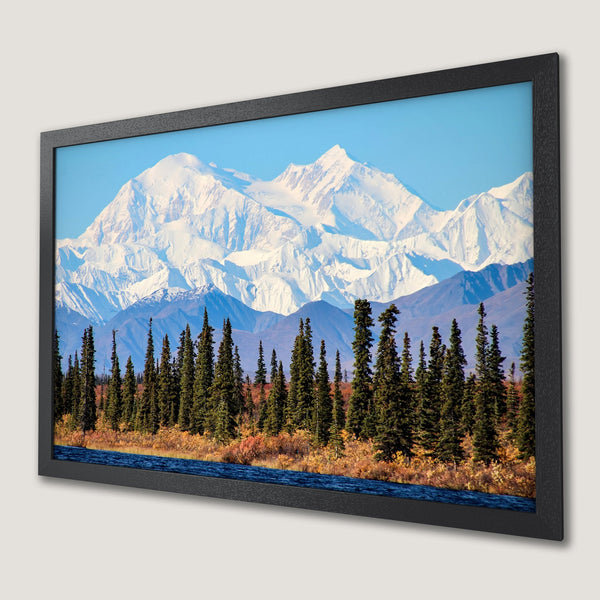 Framed Poster of majestic mountain landscape in blue, white, and green tones. Bring the beauty of nature into your home!