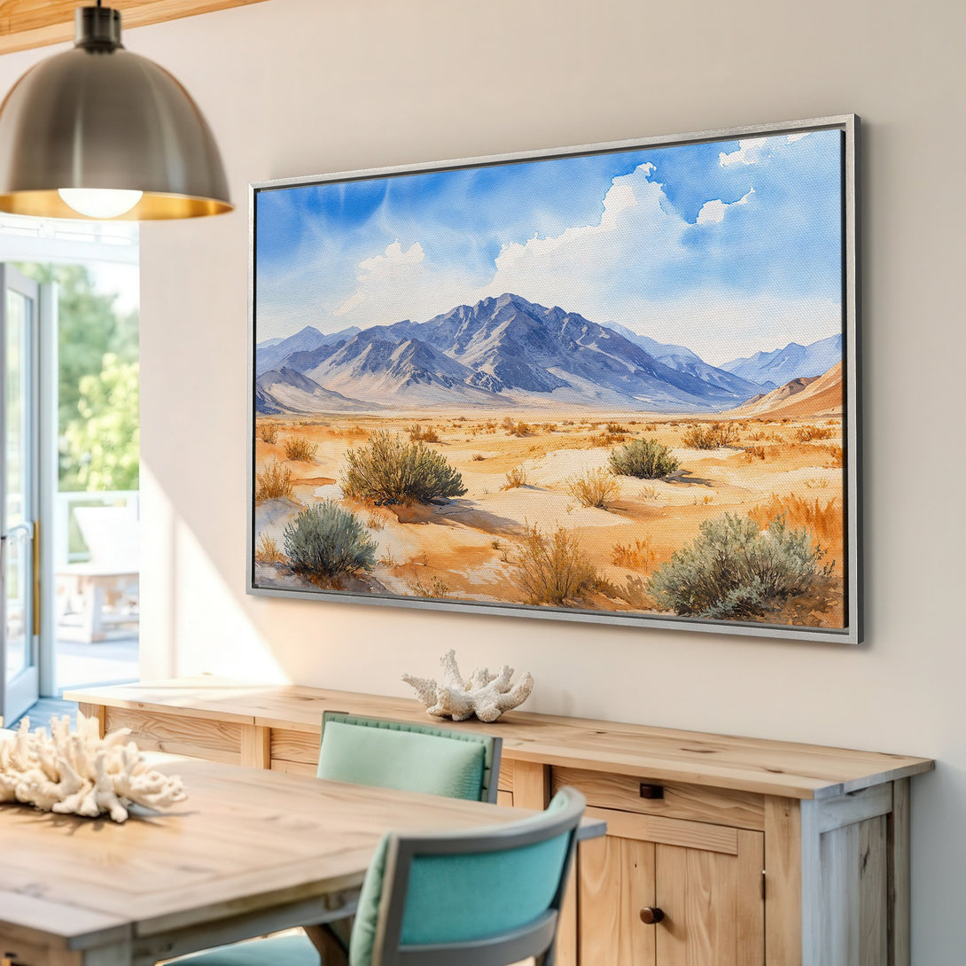 Framed Wall Art: Watercolor desert landscape with blue mountains, sky, and warm earth tones. Add serene art to your home!
