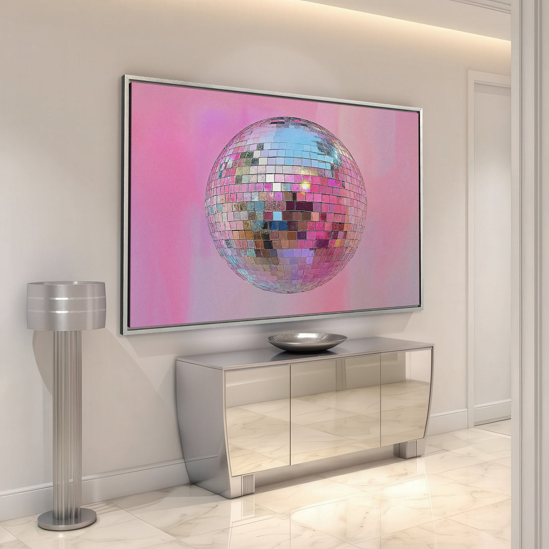 Framed Wall Art featuring a disco ball on a pink background. Modern, stylish decor with a vibrant, colorful palette to elevate your space.