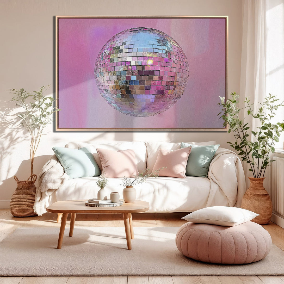Framed Wall Art featuring a disco ball in a pink and silver palette, perfect for adding a touch of retro glam to your living room.