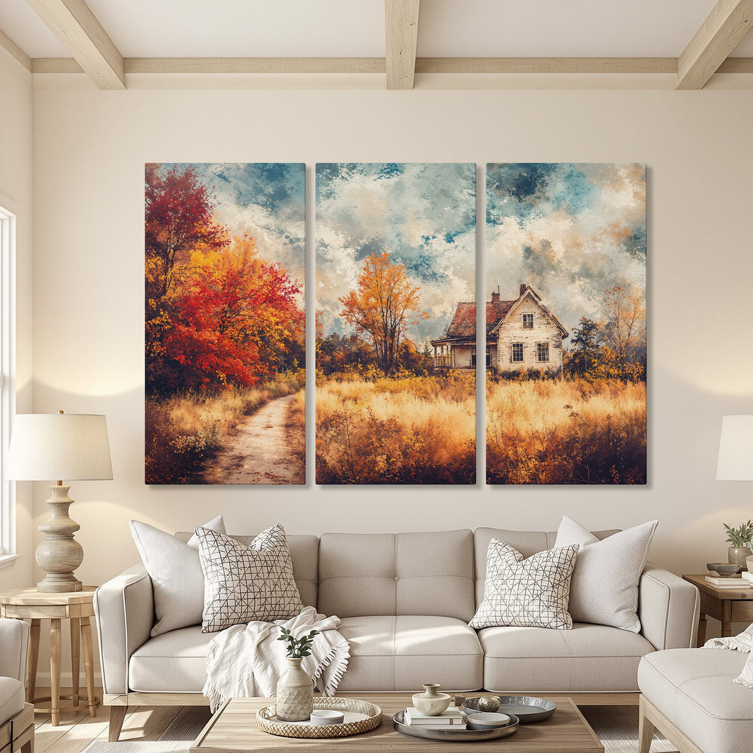 Canvas Print of a rustic autumn landscape with a house, featuring warm orange, red, and blue tones. Adds cozy charm to any living room.