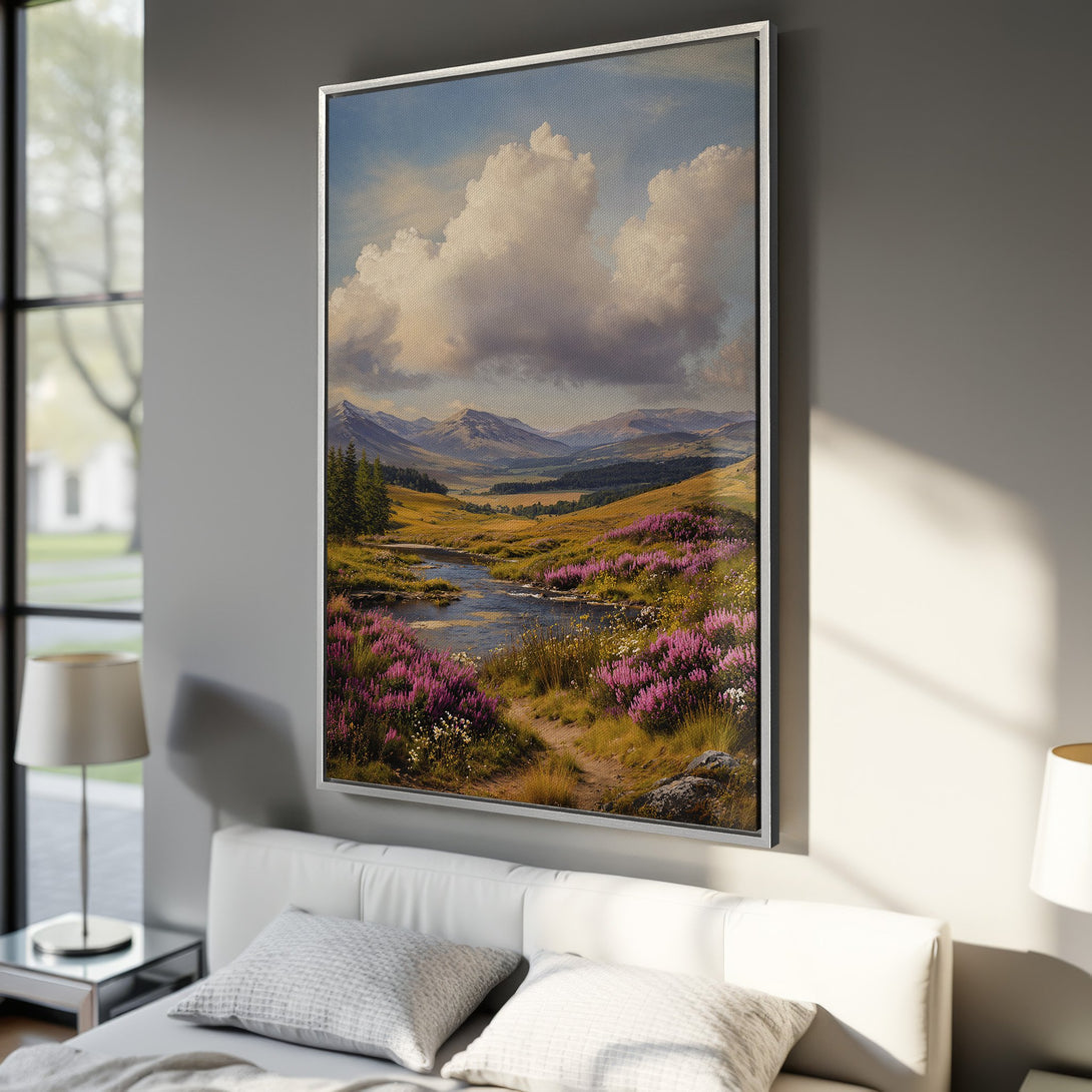 Framed Wall Art: Landscape Canvas Print featuring a serene mountain scene with a river and vibrant purple flowers. Earthy tones and a classic painting style.