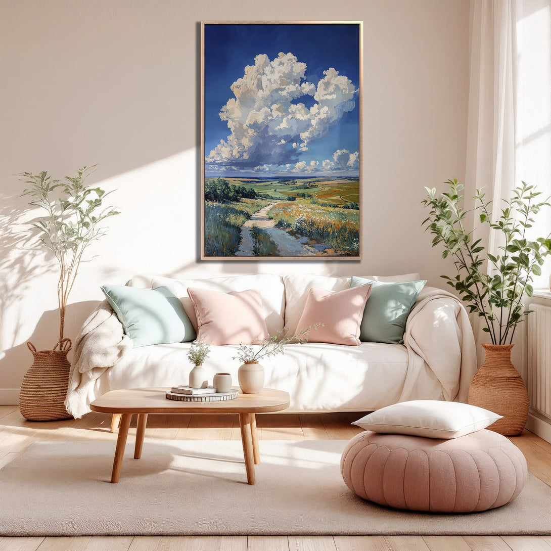 Framed Wall Art: Landscape painting with blue sky, white clouds, and green fields. Soft, warm color palette. Perfect for living room decor.