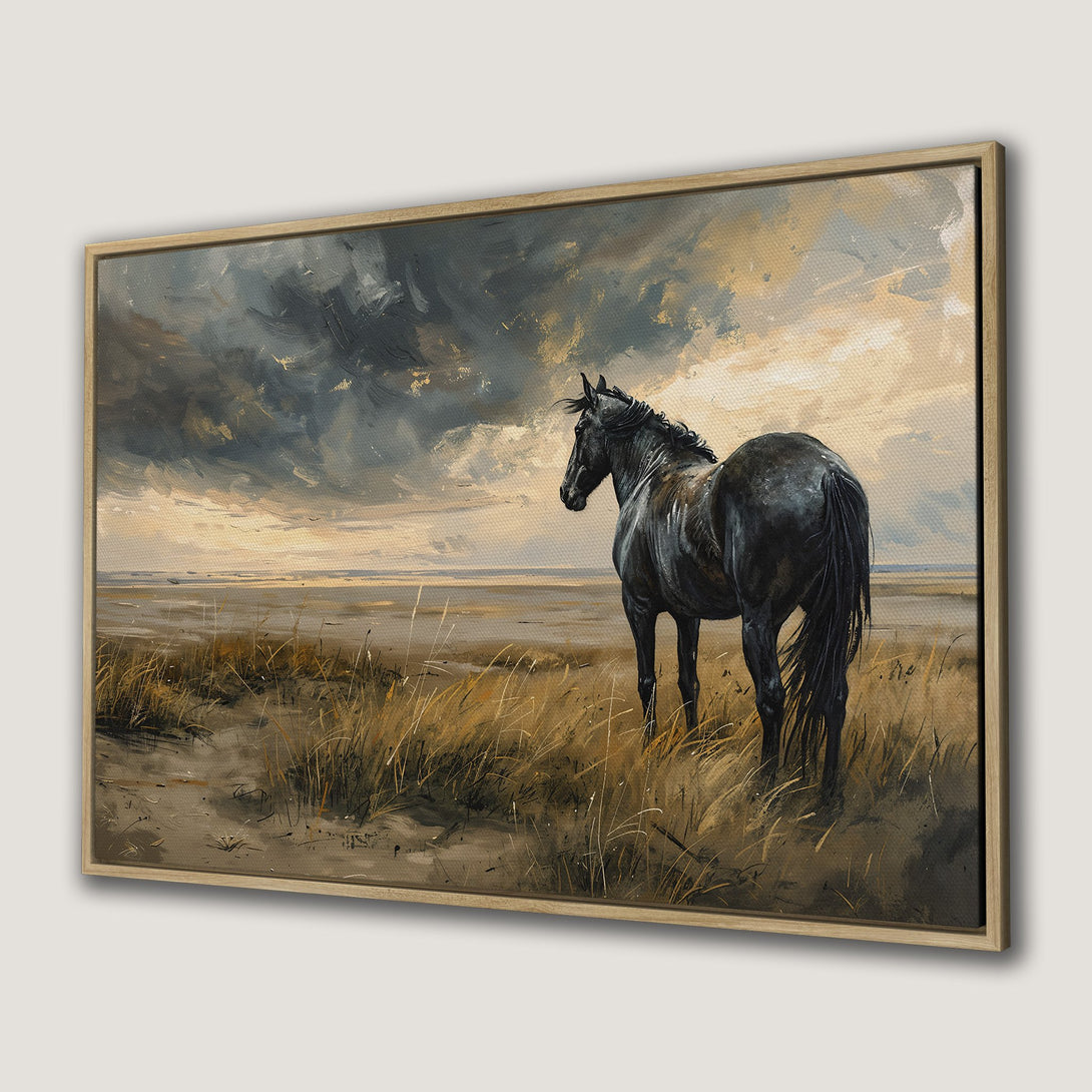 Canvas Print of a majestic black horse in a moody landscape. Earthy tones and dramatic skies. Perfect Framed Wall Art for any home.