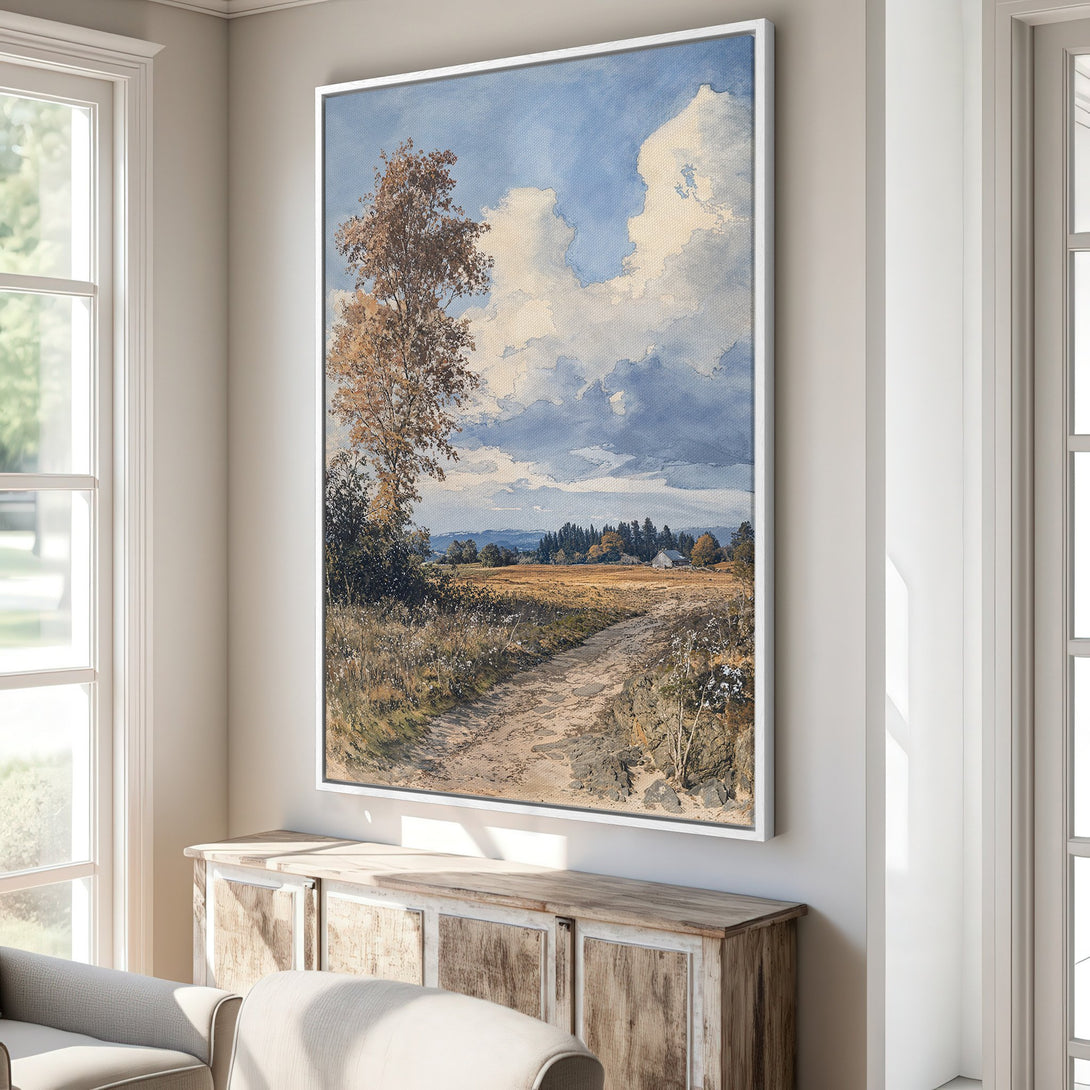 Framed Wall Art: Landscape Canvas Print with a serene countryside scene in muted earth tones and blue sky. Perfect for adding a touch of nature to your home.
