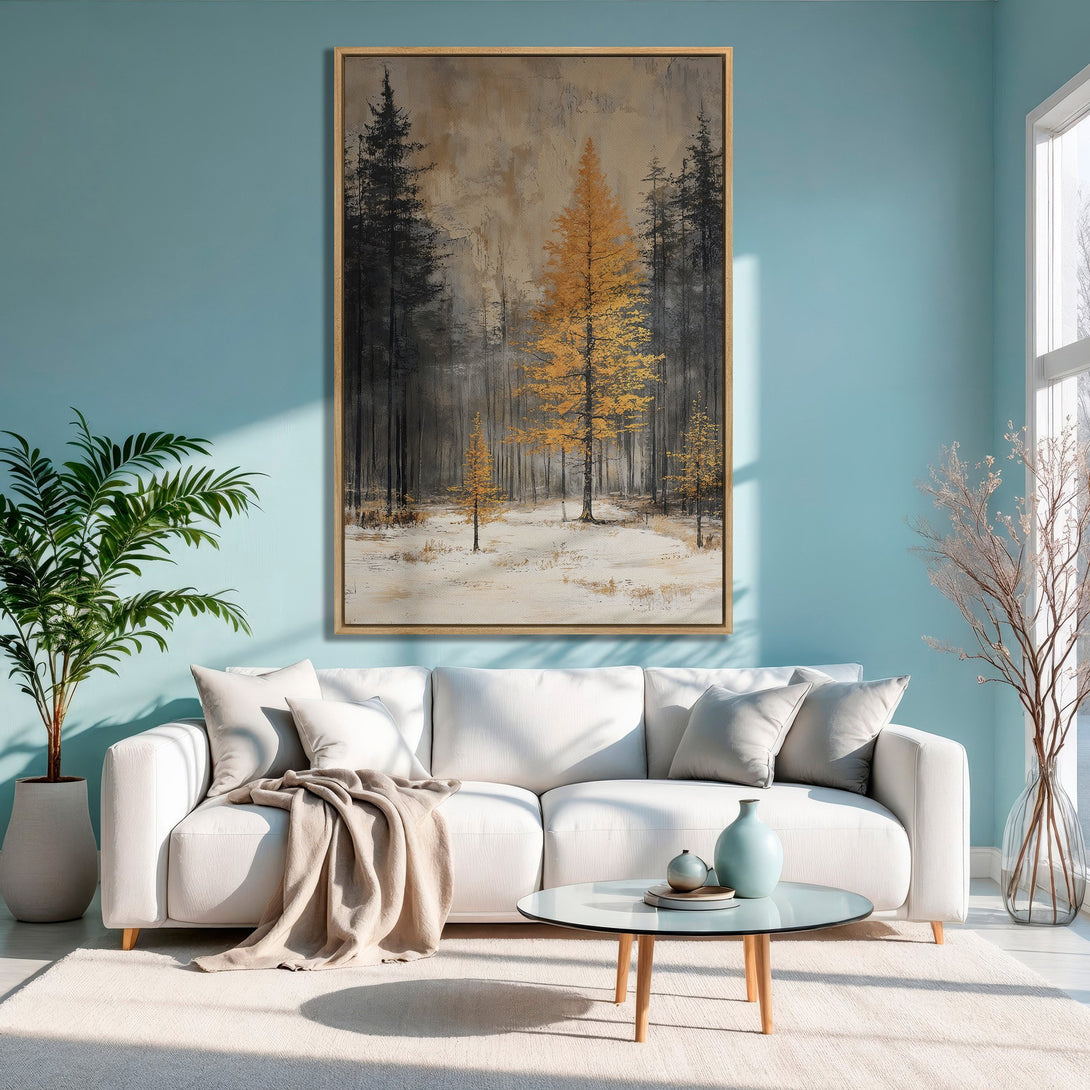 Framed Wall Art: Abstract forest scene in gold, black, and beige. Modern canvas print adds warmth and style to a living room with a blue wall.