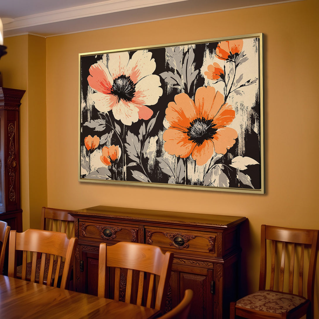 Canvas Print of floral art in a living room. Features large, abstract flowers in orange, cream, and black. Perfect for adding a pop of color!