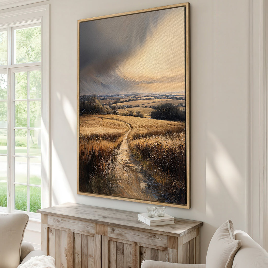 Framed Wall Art: Landscape Canvas Print with a warm, earthy color palette. Captures a serene field scene with a dramatic sky, perfect for any home.