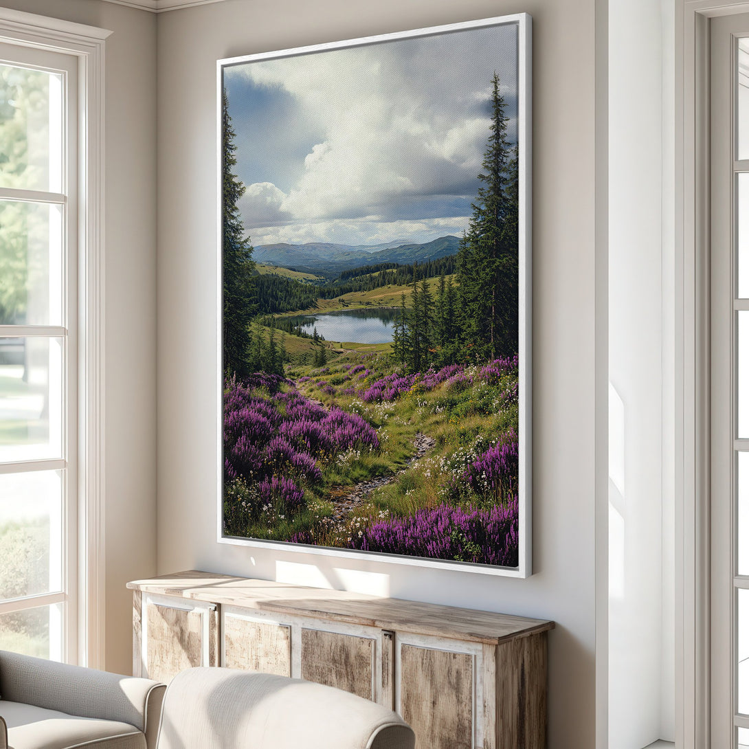 Framed Wall Art: Landscape Canvas Print with vibrant purple wildflowers, serene lake, and lush green trees. Adds a touch of nature's beauty to any room.