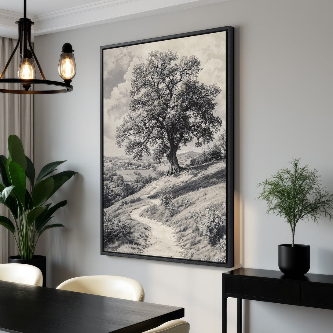 Framed Wall Art: Black and white landscape Canvas Print featuring a majestic tree on a hillside, perfect for adding a touch of nature to your home.