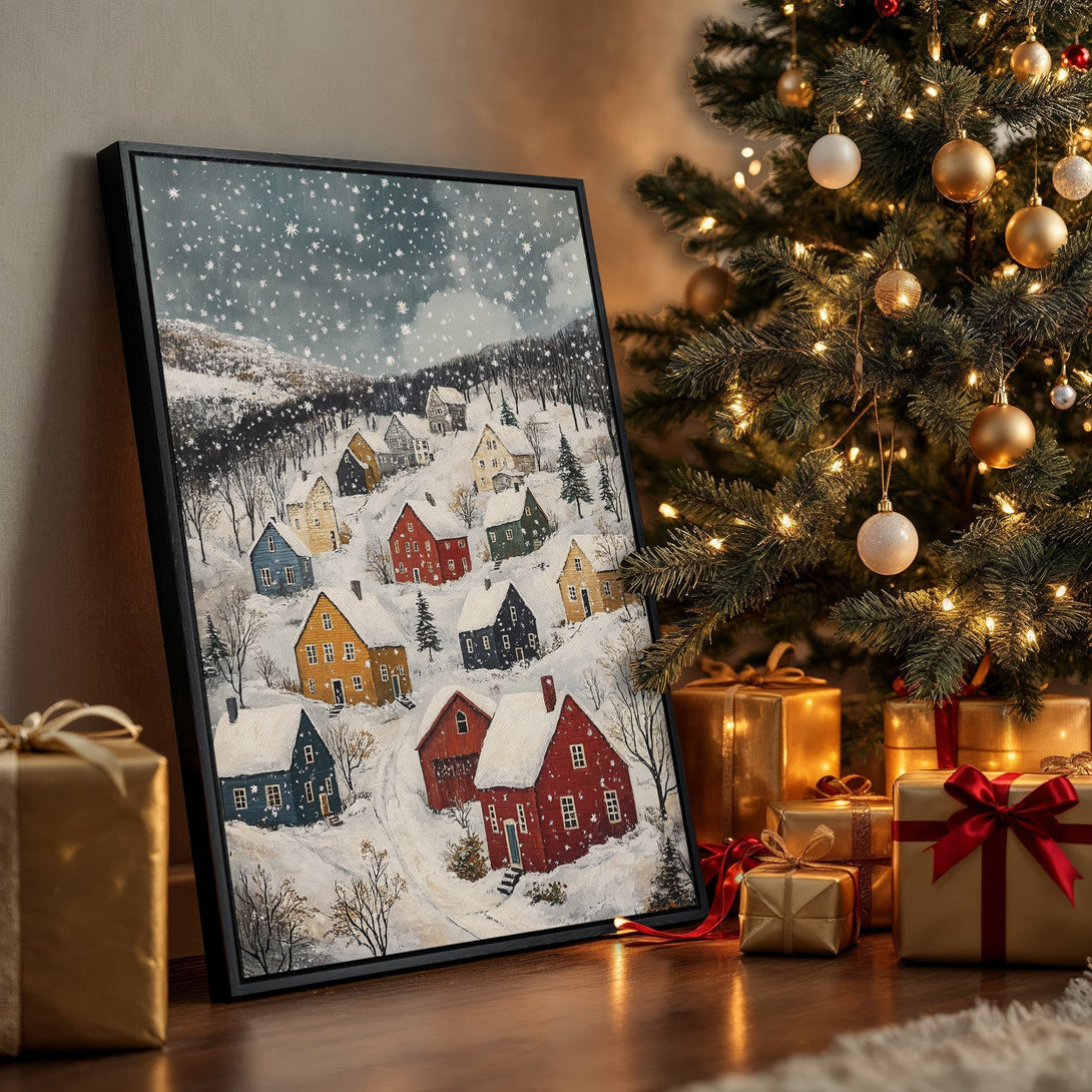 Framed Wall Art: Winter village scene canvas print with a cozy, rustic style. Featuring a snowy landscape with colorful houses, perfect for holiday decor.