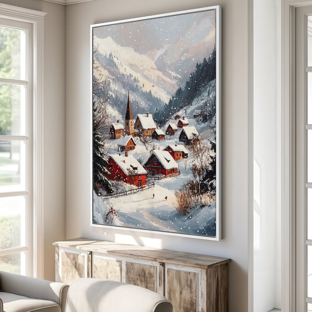Framed Wall Art: Winter village scene in a painterly style. Features a snowy landscape with red houses, a church, and a cool, muted color palette. Perfect for cozy decor.