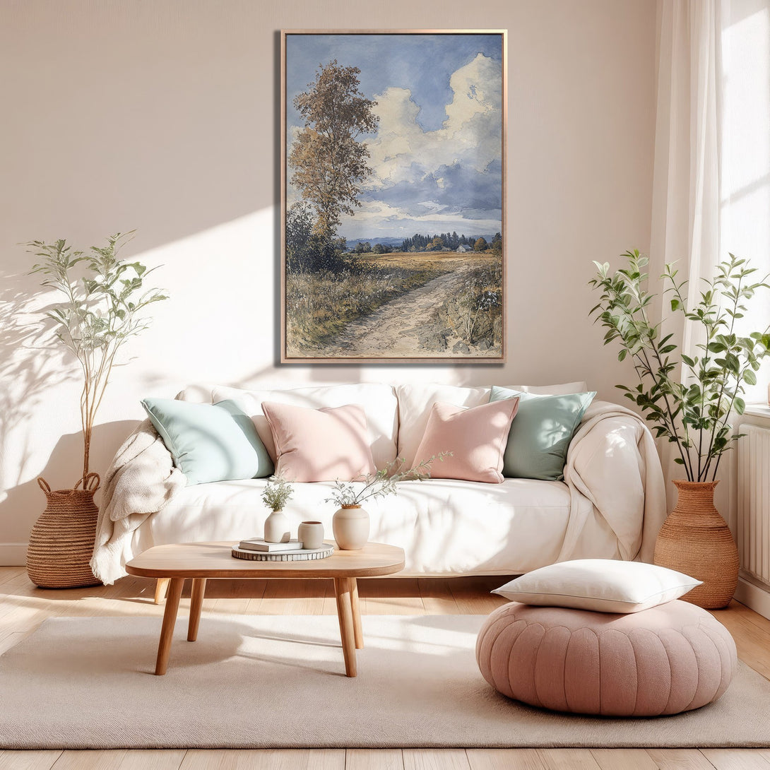 Framed Wall Art: Landscape Canvas Print in soft blue, beige, and pink tones. Adds a touch of serene beauty to any living room. Shop now!