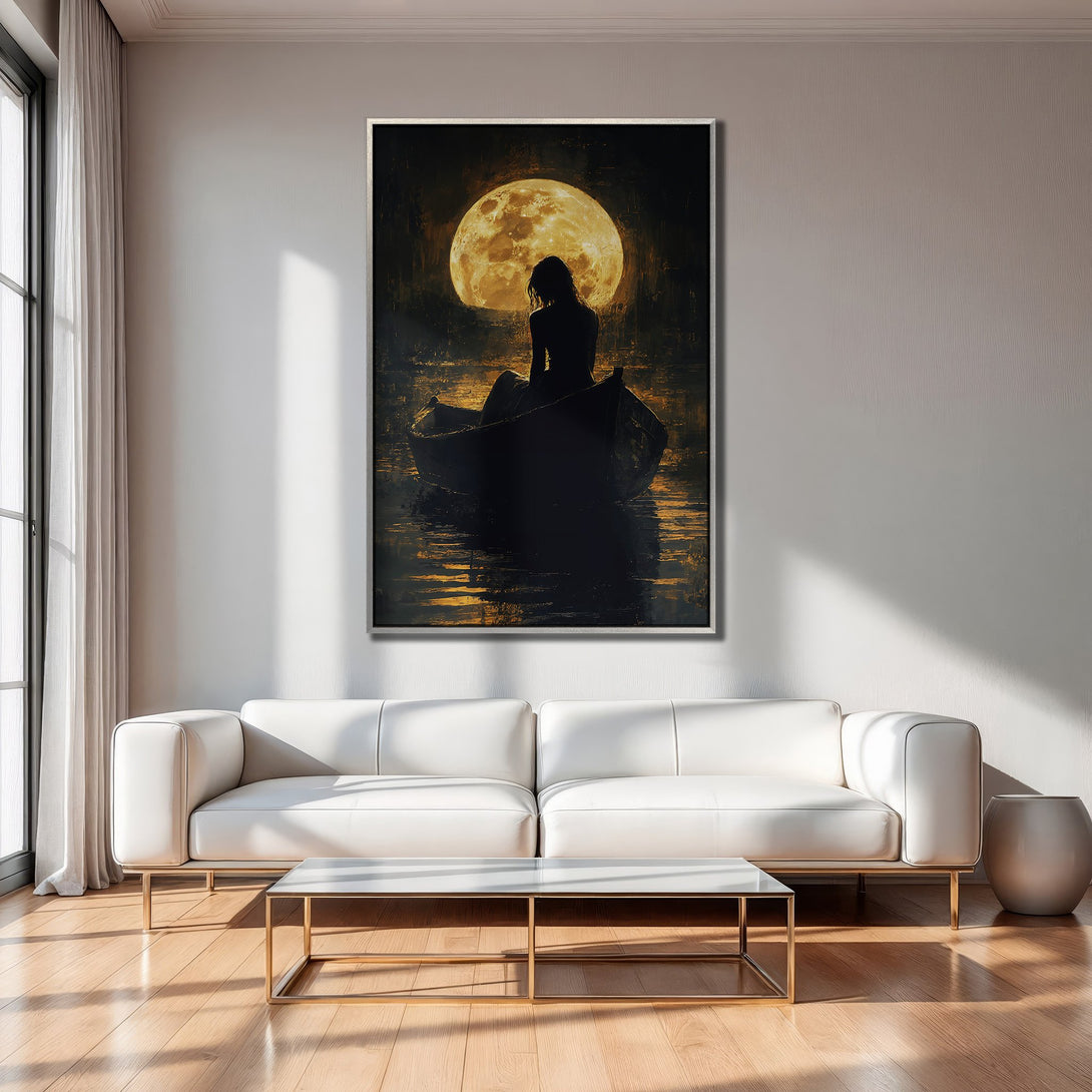 Framed Wall Art featuring a woman in a boat under a moon, moody style with gold and black hues. Perfect for adding a touch of elegance to your home.
