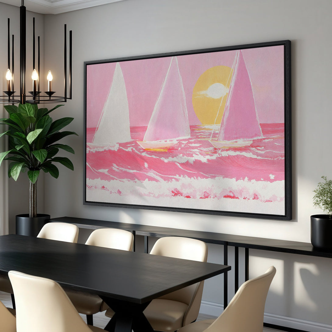 Framed Wall Art featuring sailboats in a pink and yellow sunset. Modern, abstract style Canvas Print adds a pop of color to any interior.