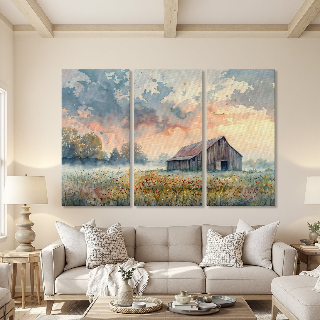 Canvas Print of a watercolor barn scene in a living room. Features a rustic style with a soft blue, orange, and green color palette.