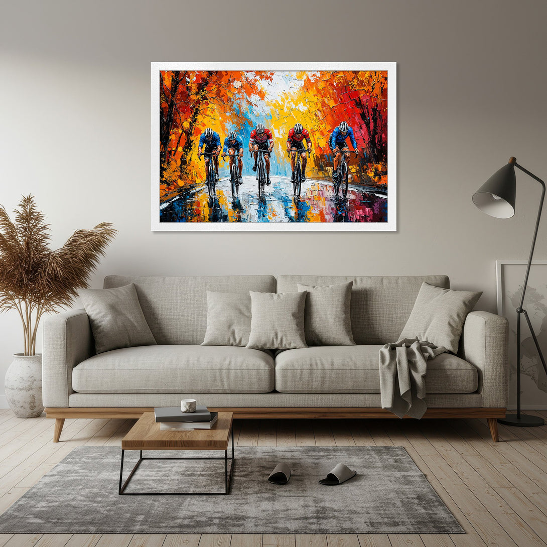Framed Poster of cyclists racing, impressionistic style with vibrant orange, red, and blue color palette. Perfect wall art for any space.