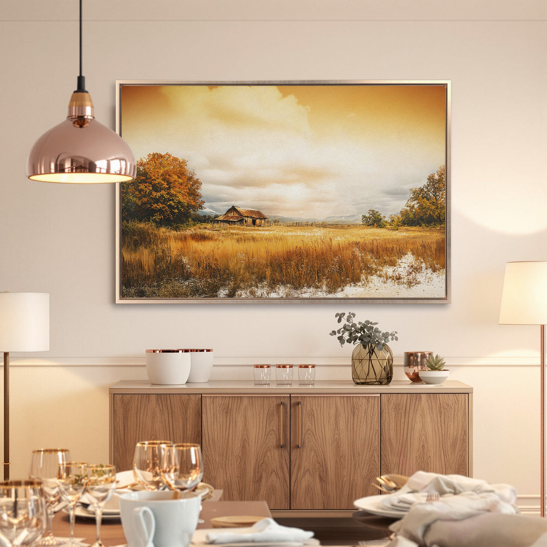 Framed Wall Art: Rustic landscape Canvas Print with warm, golden tones. Perfect for adding a cozy, farmhouse feel to your dining room.