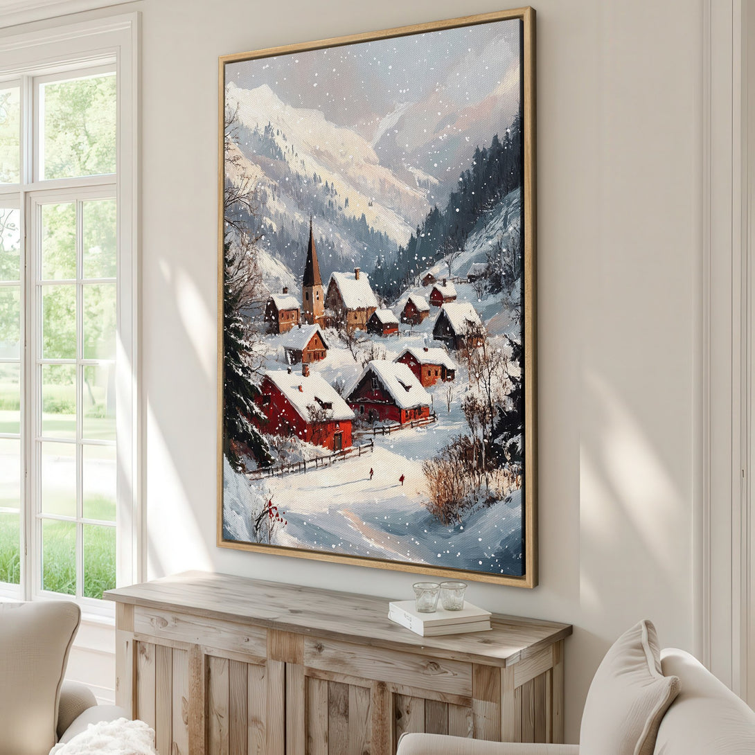 Framed Wall Art: Winter village scene canvas print with snowy mountains, red roofs, and cool blue/white palette. Perfect for cozy home decor.