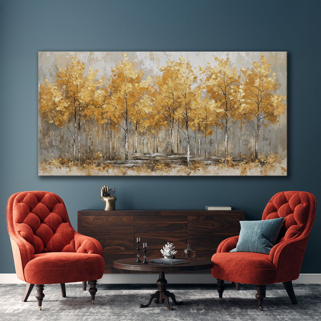 Framed Wall Art: Abstract golden trees painting in a modern living room. Warm neutral color palette creates a cozy and stylish interior.