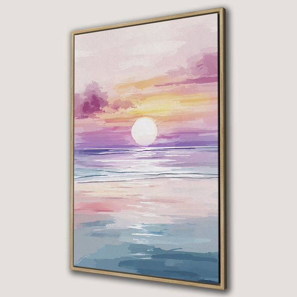 Framed Wall Art: Sunset over the ocean. Watercolor style canvas print with pink, purple, and blue hues. Perfect coastal decor for any room.