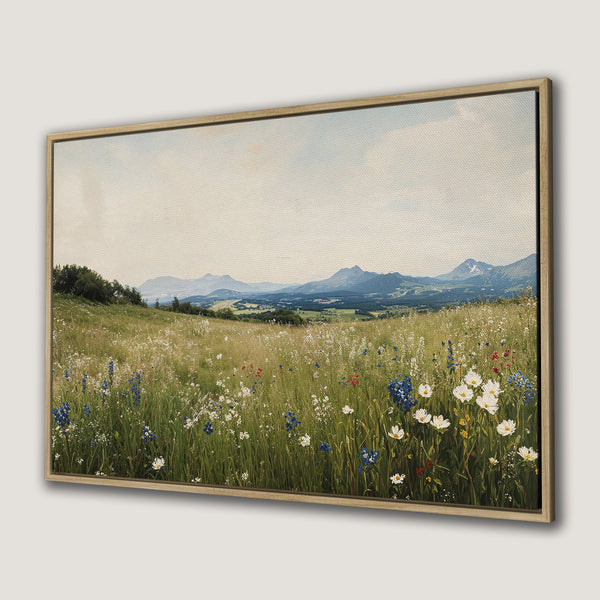 Framed Wall Art: Landscape Canvas Print of a wildflower meadow with mountains, featuring a soft, natural color palette for a serene interior.