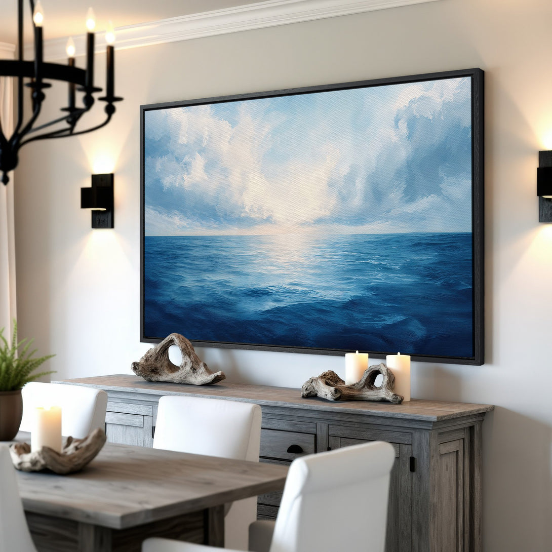 Framed Wall Art: Ocean seascape Canvas Print in blue and white hues. Coastal decor for a serene living room or dining area.