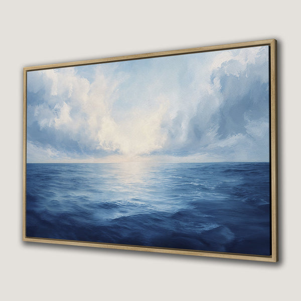 Framed Wall Art: Serene ocean landscape Canvas Print in blue and white tones. Coastal art perfect for adding a touch of tranquility to your home.