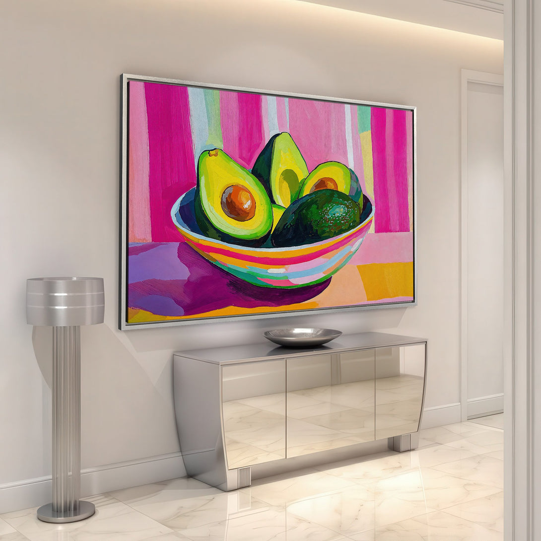 Framed Wall Art: Vibrant avocado still life painting in a modern style with a pink, green, and yellow color palette. Add a pop of art to your home!