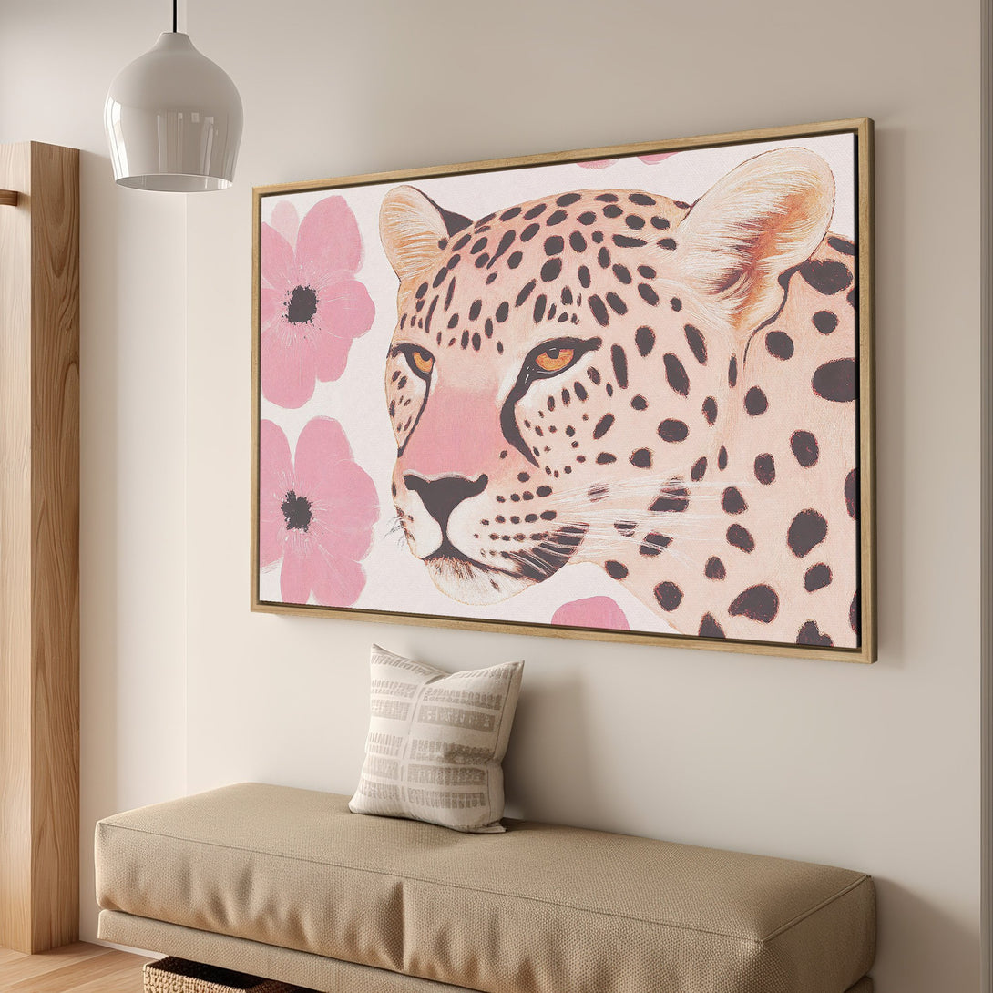 Framed Wall Art featuring a leopard portrait in a modern style with a pink and neutral color palette. Perfect for adding a touch of safari chic to your home.