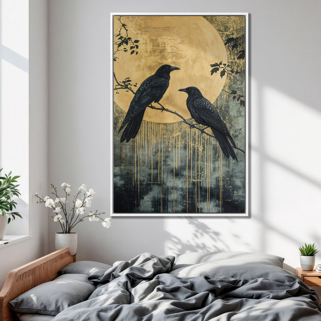Framed Wall Art featuring two black crows on a branch against a gold moon. Moody, artistic style with a dark, gold, and teal color palette. Perfect for bedroom decor.