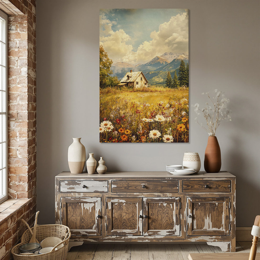 Framed Wall Art: Rustic landscape Canvas Print with a mountain cabin scene, warm yellow and blue color palette, perfect for adding a cozy touch to any room.