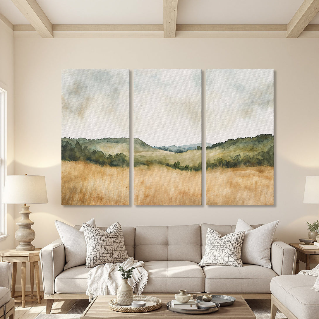 Canvas Print of a watercolor landscape in a warm, neutral interior. Features a field and hills in earthy tones of green, brown, and beige. Perfect wall art!
