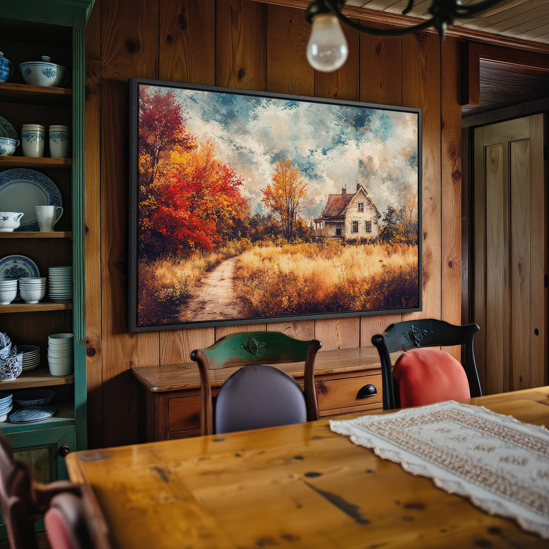 Framed Wall Art featuring a rustic autumn landscape with a house, warm color palette. Perfect for cozy home decor.