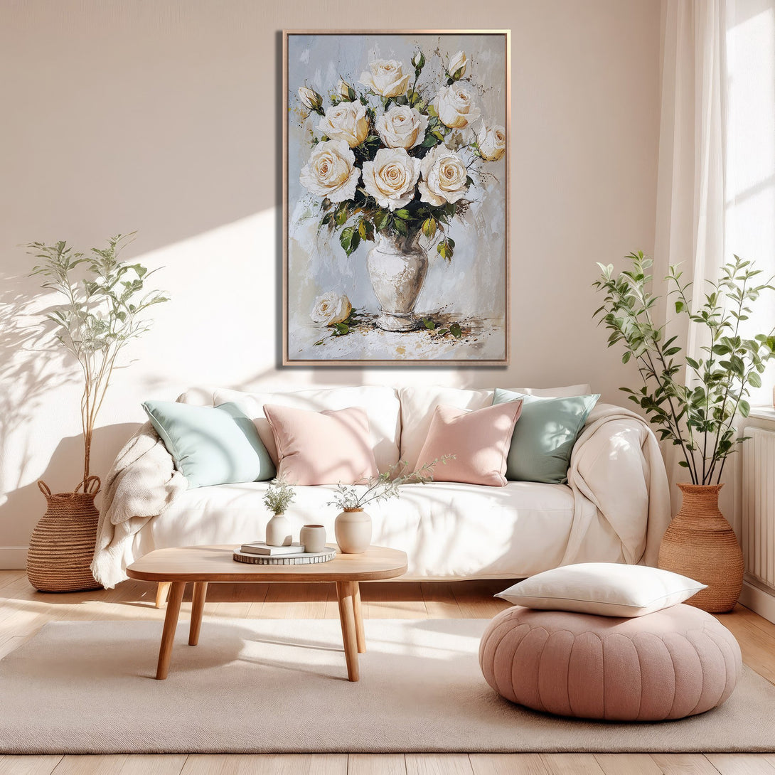 Framed Wall Art: Elegant floral canvas print of white roses in a vase, displayed in a cozy, neutral-toned living room. Perfect for adding a touch of sophistication.