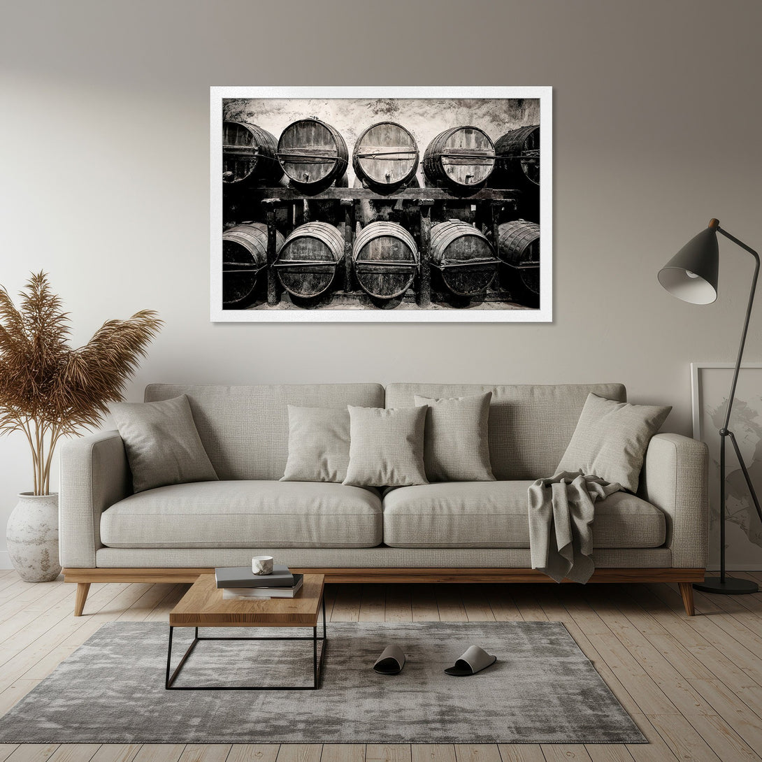 Framed Poster featuring a black and white photo of wine barrels. Rustic style, neutral color palette, perfect for home decor.