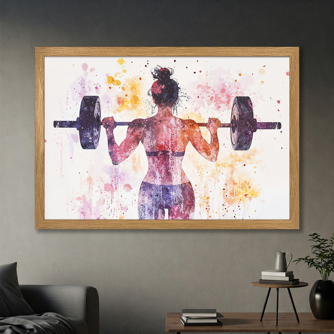 Framed Poster of a watercolor woman lifting weights. Artistic style with a vibrant pink, orange, and purple color palette. Perfect for gym decor.