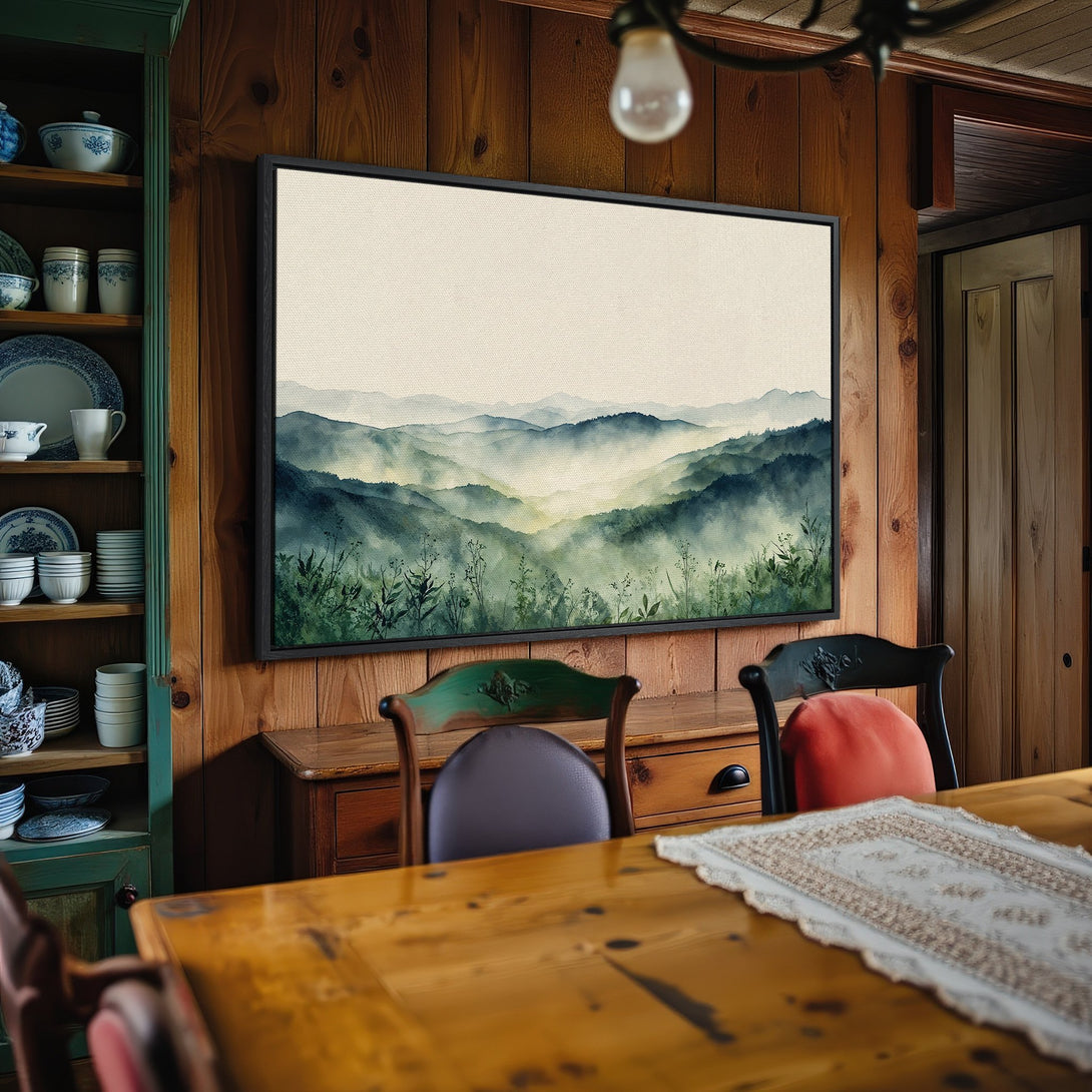 Framed Wall Art: Watercolor mountain landscape in green and blue hues. Adds a serene touch to any space. Perfect for nature lovers.