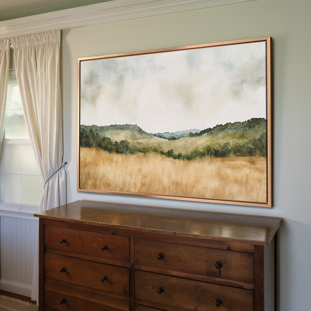 Framed Wall Art landscape print with watercolor style, featuring a field in warm tones of gold, green, and blue, perfect for home decor.